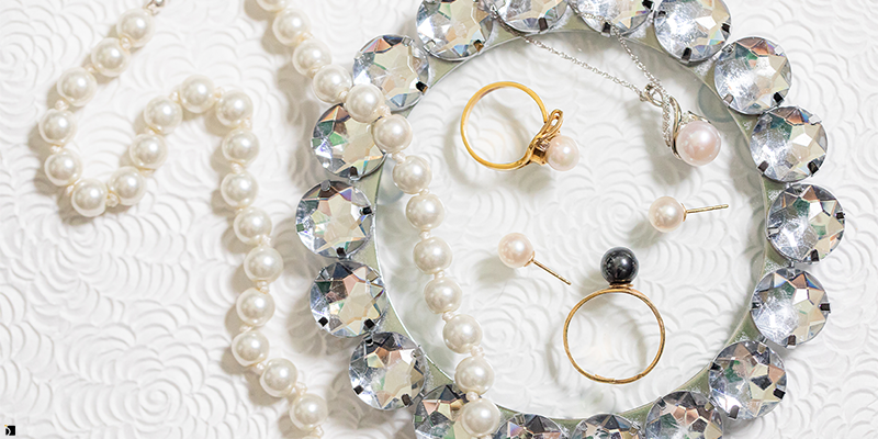 Image Showcasing Restored and Serviced Pearls Necklace Ring Jewelry Pieces
