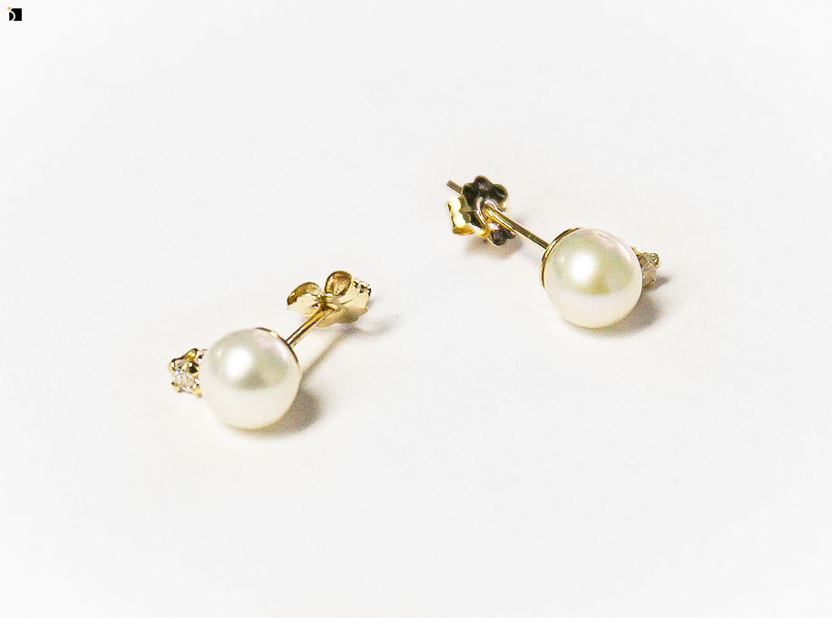 Image showcasing the After #98 of a Pearl Earrings Set Being Restored Through Pearl Gemstone Resetting and Premier Earring Services