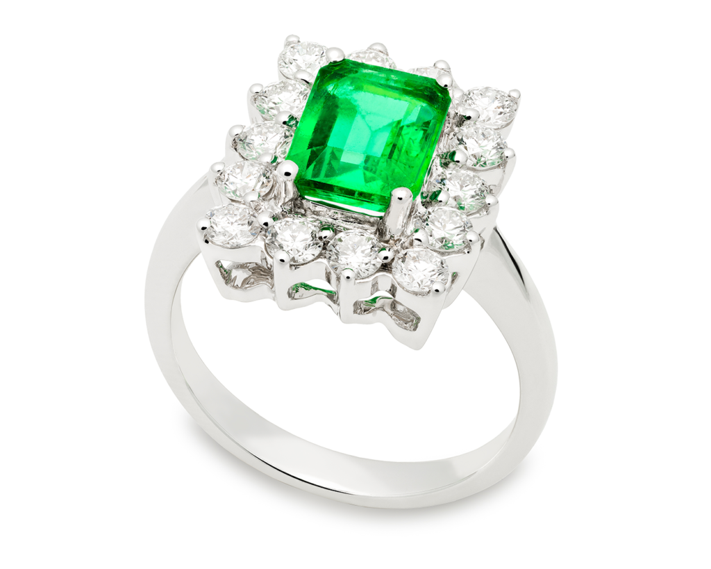 Image Showcasing Silver Diamond Ring with Unique Emerald Center Stone Settings