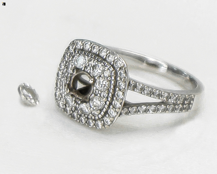 Before #132 Angled View of Diamond Halo Ring Needing Gemstone Resetting