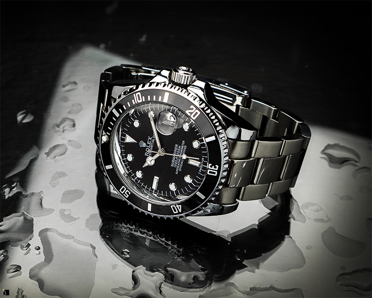 Water Resistant Watches Feature Rolex Timepiece with Water Droplets