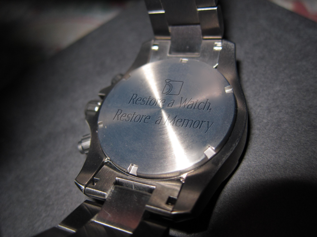 Image showcasing watch with engraving on back of the case