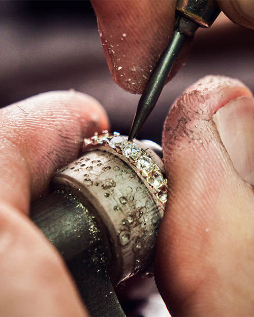 Image showcasing diamond ring being restored by My Jewelry Repair's Master Jeweler