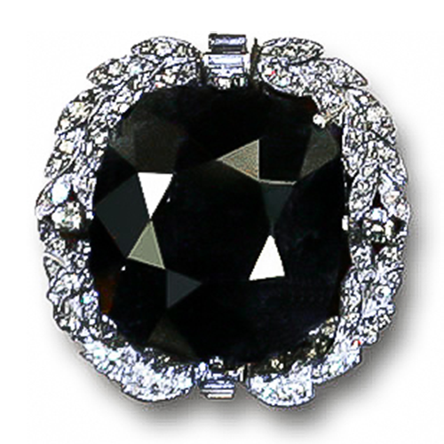 Black Orlov Diamond Set in Diamond Necklace Setting on Display