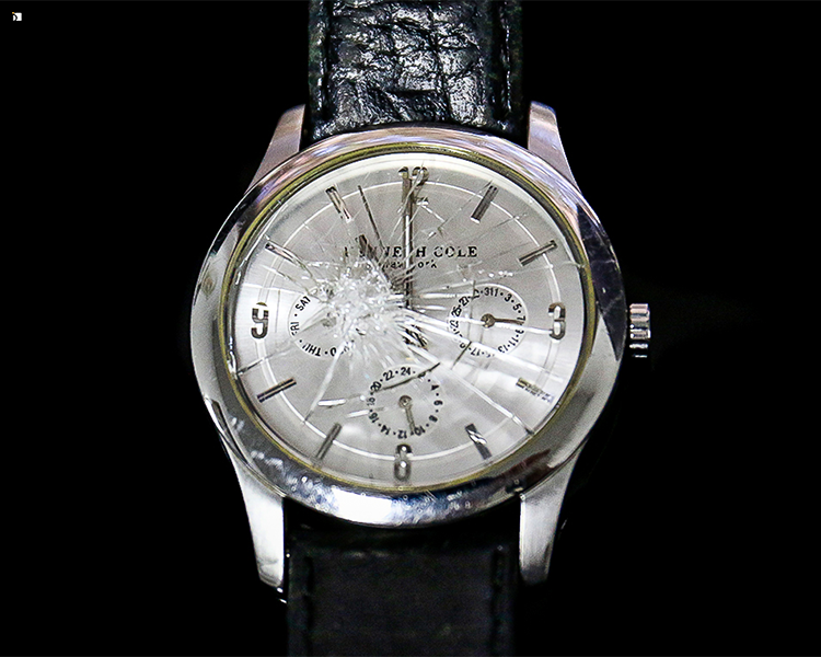 Before #105 Kenneth Cole Timepiece with a Shattered Crystal and Dead Battery Prior to Watch Restoration
