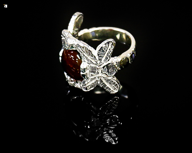 After #110 Side View of Red Gemstone Silver Ring Restored by the work of Master Jewelers