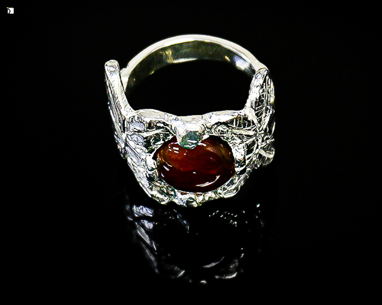 After #110 Front View of Red Gemstone Silver Ring Restored in Professional Jewelry Facility