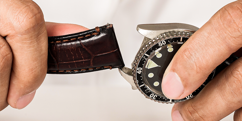Certified Watchmaker Servicing Timepiece Leather Strap with Premier Watch Band Repair Service