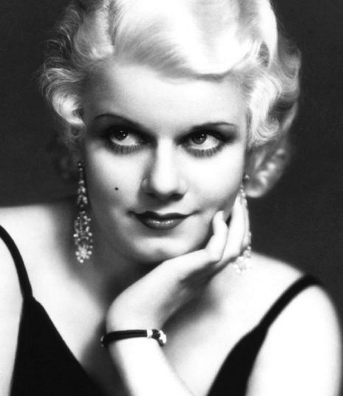 Image of Actress Jean Harlow sporting diamond drop earrings in black and white