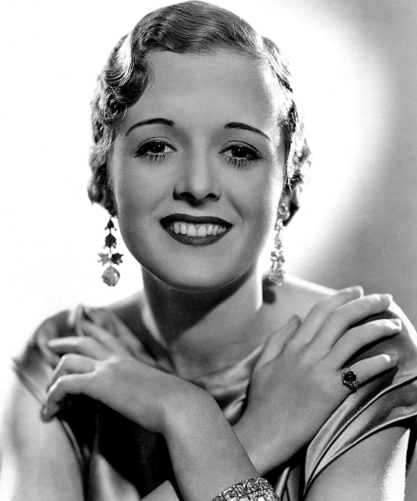 Image showcasing 1930s actress Mary Astor wearing jewelry in black and white