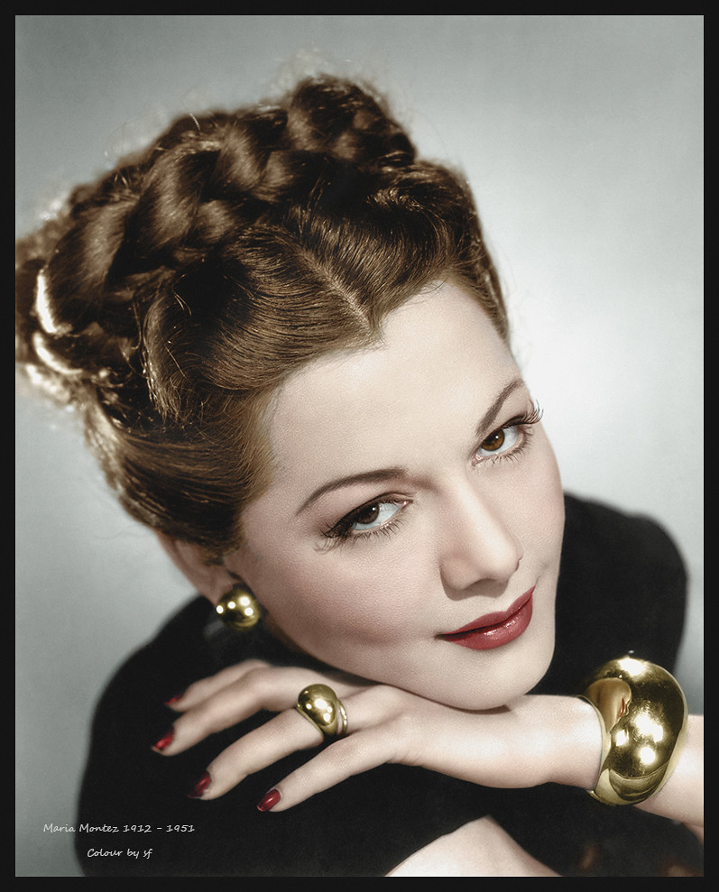 Photo of 1940s actress Maria Montez wearing gold cocktail ring with matching bracelet and earrings
