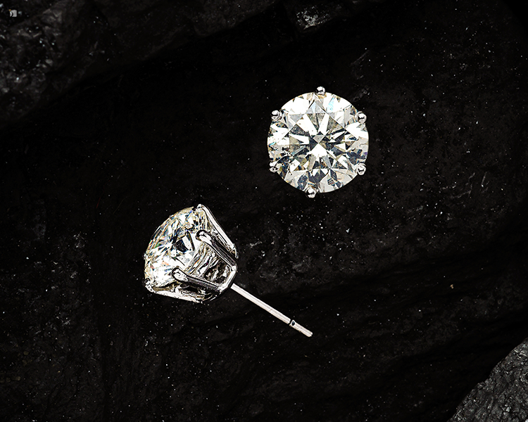 Diamond Gemstone Stud Earrings Fine Jewelry Displayed on Black Rock
