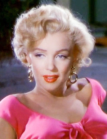 Colored photo showing Marilyn Monroe shooting her film, "Niagra" wearing gold drop hoop earrings circa 1953