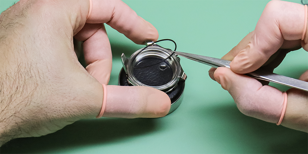 Close Up of Certified Watchmakers Bench Performing Premier Watch Gasket Replacement Services
