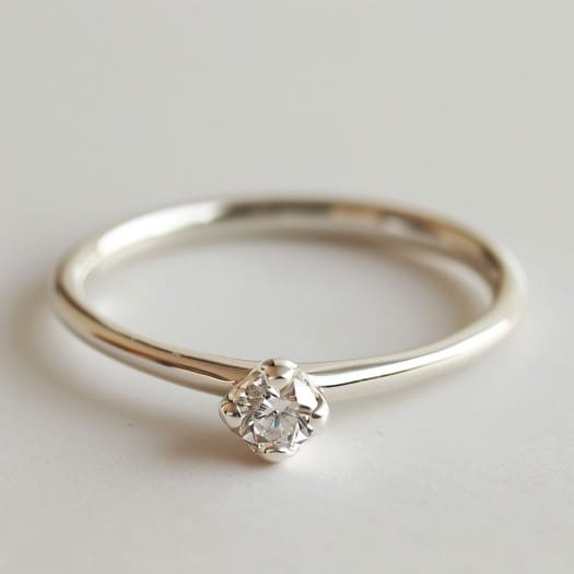 Image showcasing simple white gold diamond ring