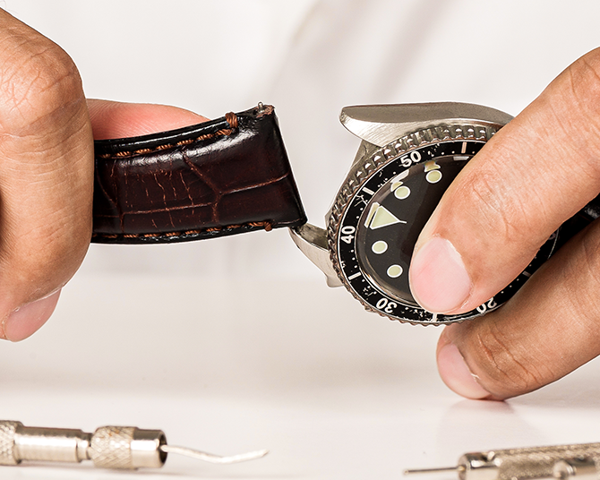 Certified Watchmaker Servicing Timepiece Leather Strap with Premier Watch Band Repair Services