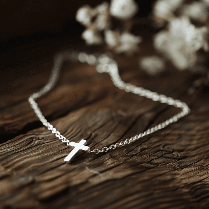 Photo of silver bracelet with cross pendant