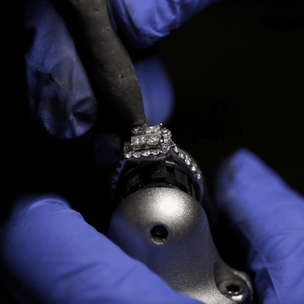 Image showcasing MJR jeweler repairing diamond ring